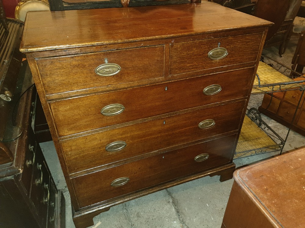Good solid Georgian oak chest of drawers. View IV