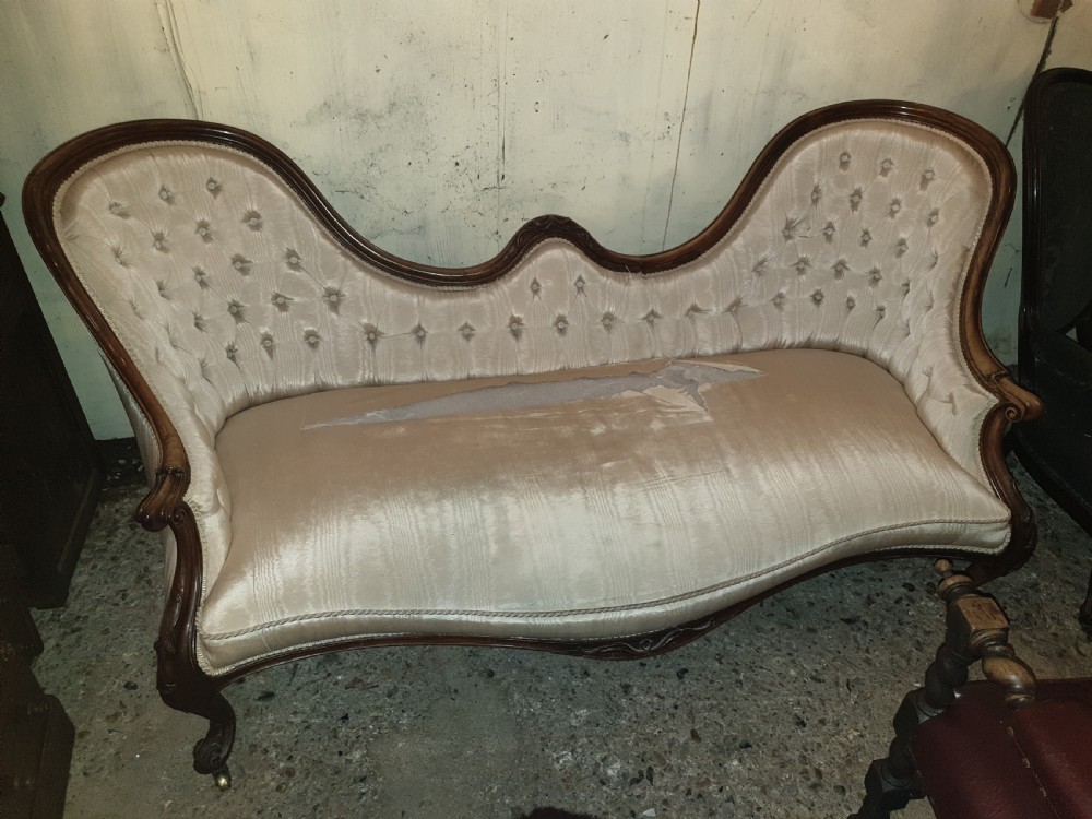 Mid Victorian rosewood double spoon back chaise longue. 