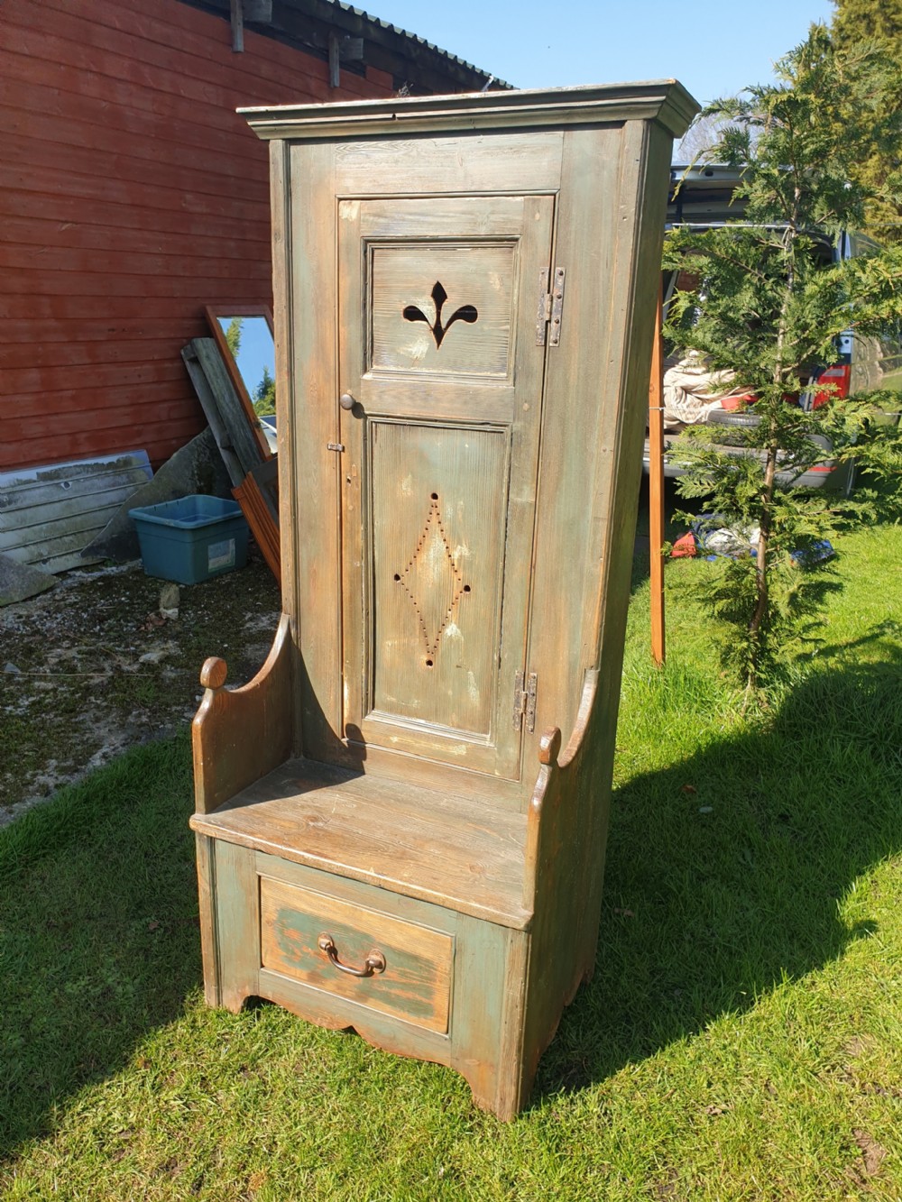 Early 20th century hall seat with cupboard. 