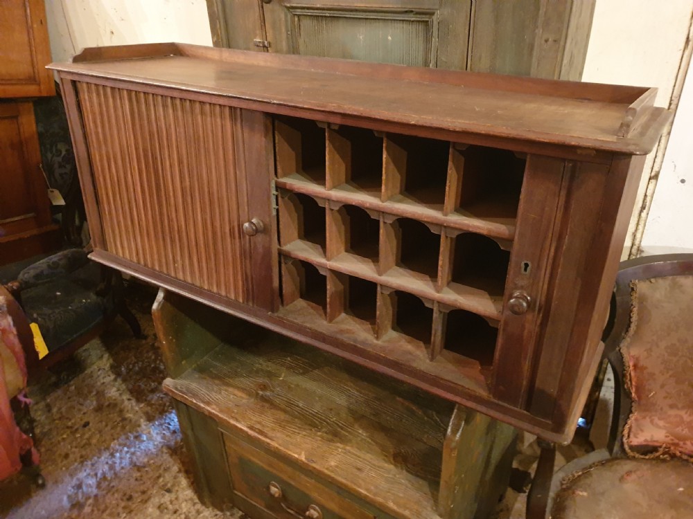 Late Victorian tambour front cabinet 