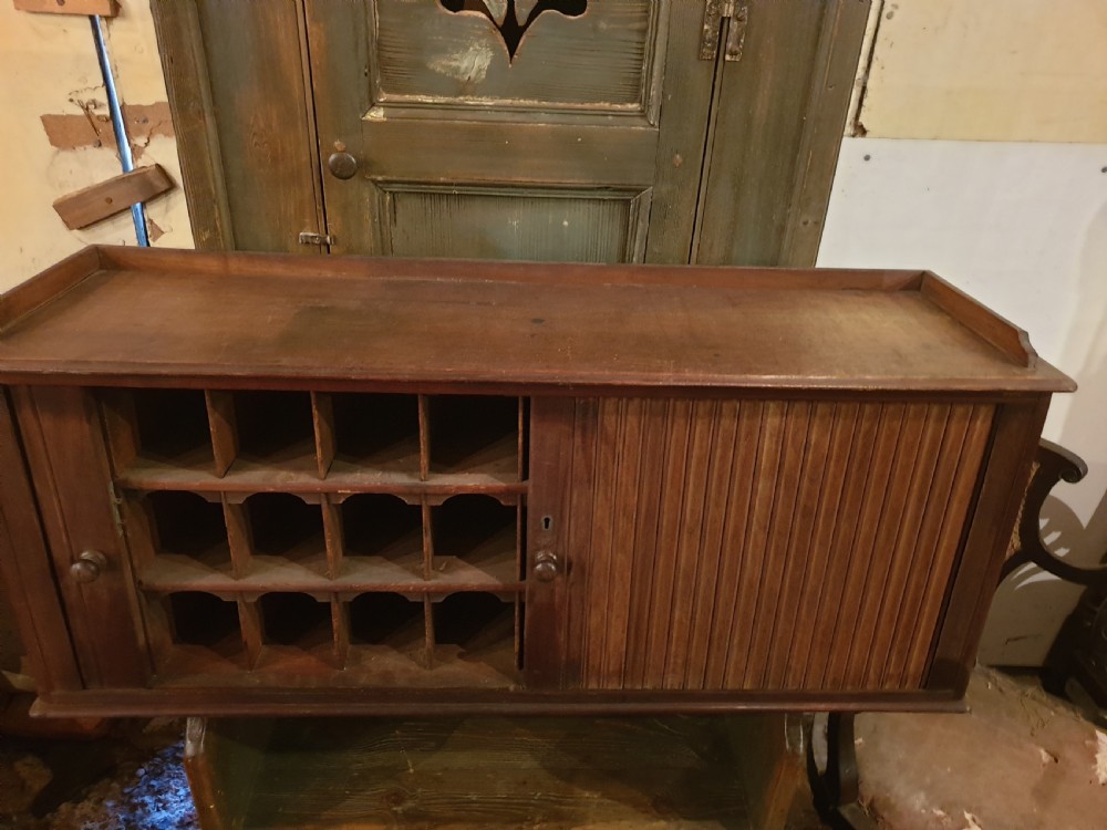 Late Victorian tambour front cabinet  View III
