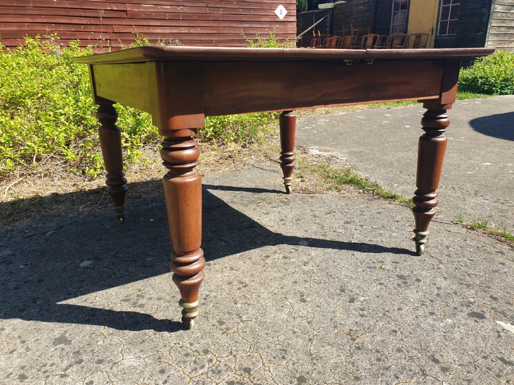 Regency 3 leaf 12 seater extending dining table.  View IV