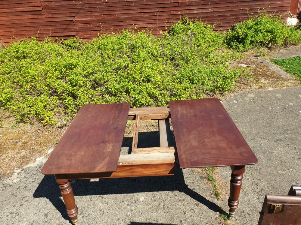 Regency 3 leaf 12 seater extending dining table.  View IX