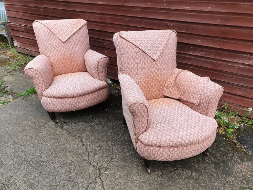 Pair of early 20th century upholstered armchairs.  View II