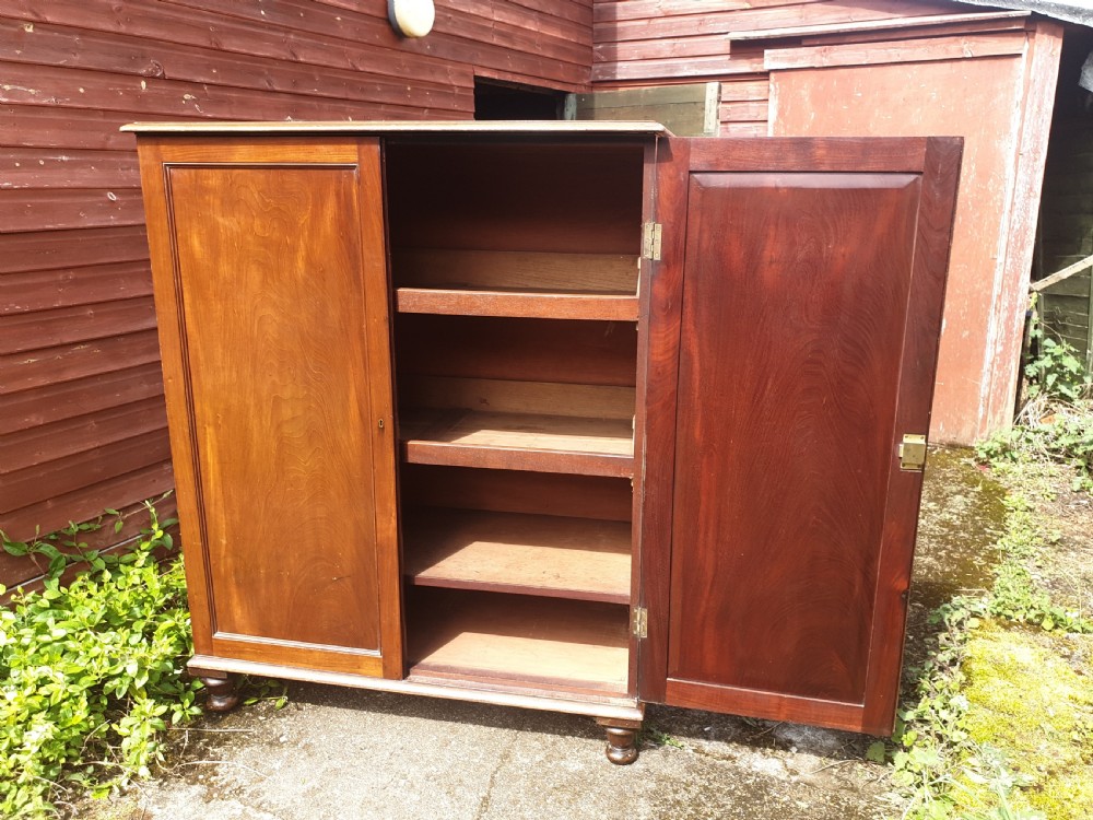Good practical Regency 2 door cupboard. 