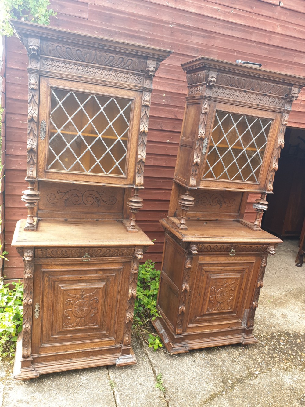 Pair of oak carved side cabinets  View II