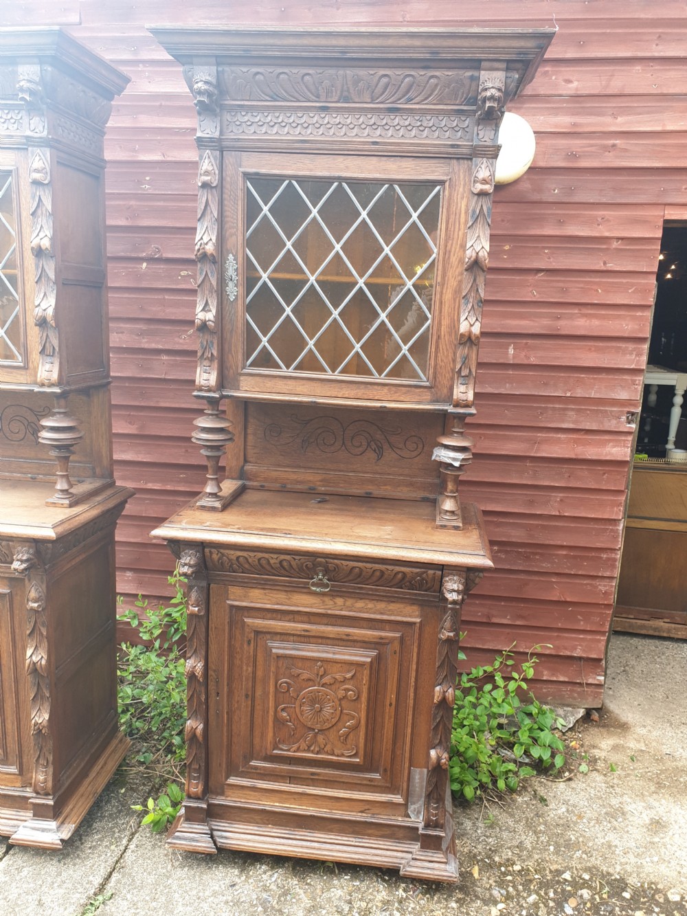Pair of oak carved side cabinets  View III