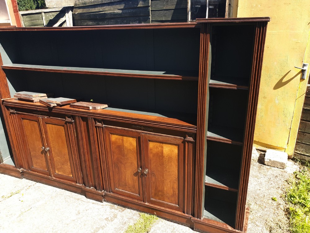 Useful long Victorian open front bookcase with cupboards.  View III