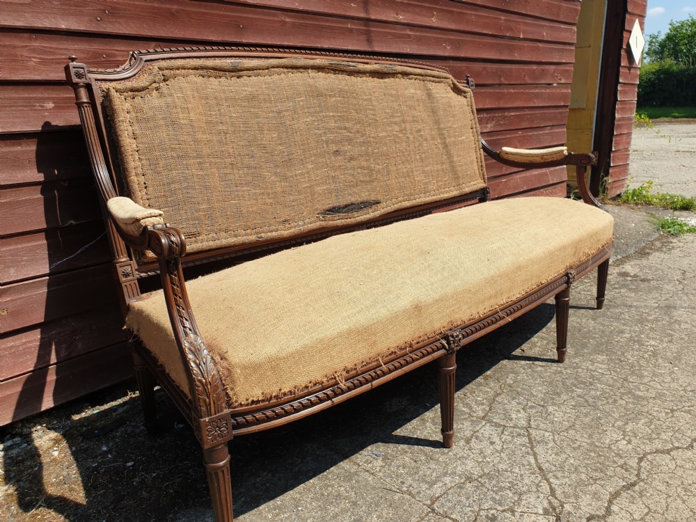 Late 19th century carved walnut sofa.  View VII