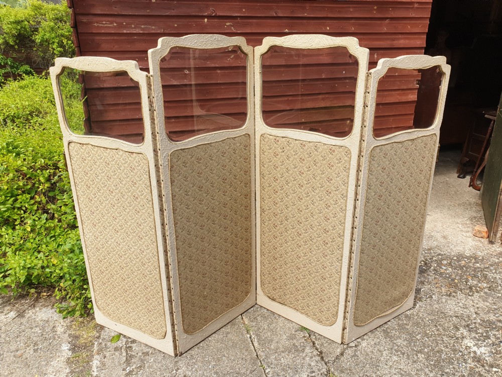 Large late Victorian folding dressing screen.  View IX