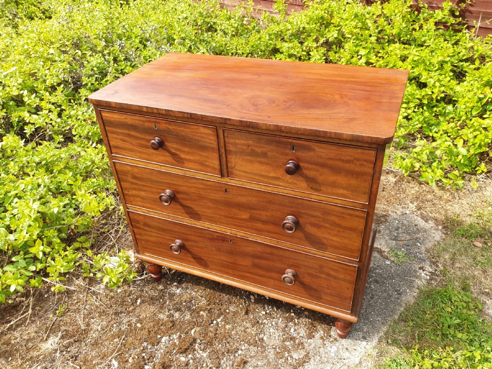 Neat and practical early Victorian mahogany chest of drawers. 