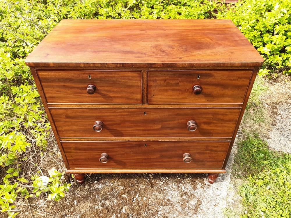 Neat and practical early Victorian mahogany chest of drawers.  View II