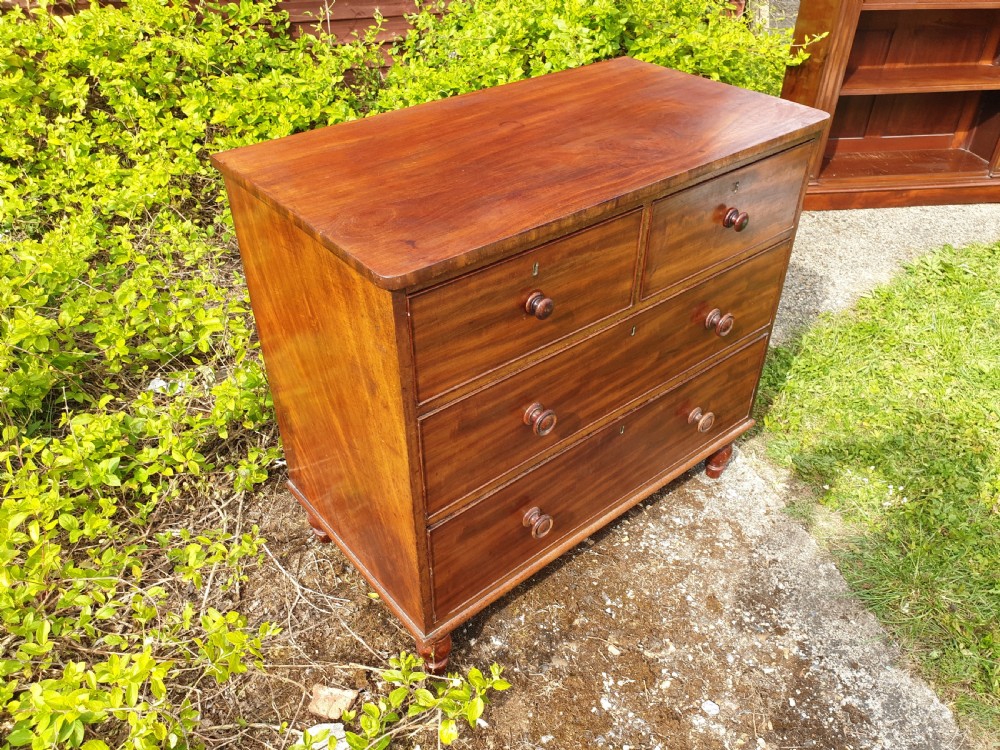 Neat and practical early Victorian mahogany chest of drawers.  View IV