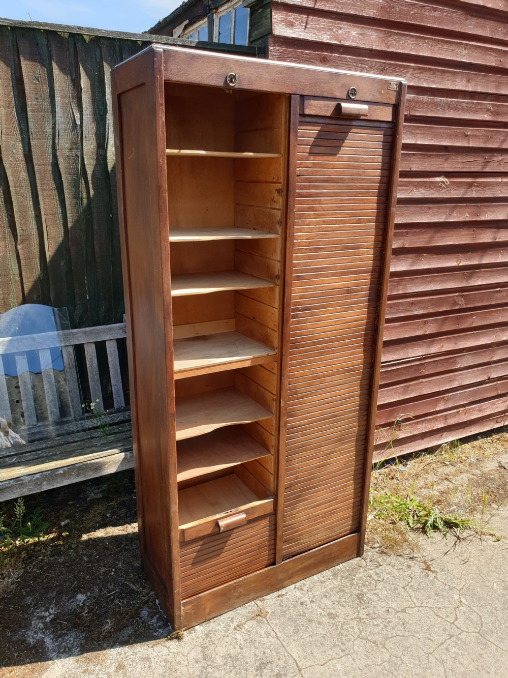 Early 20th century double tambour front cabinet.  View II