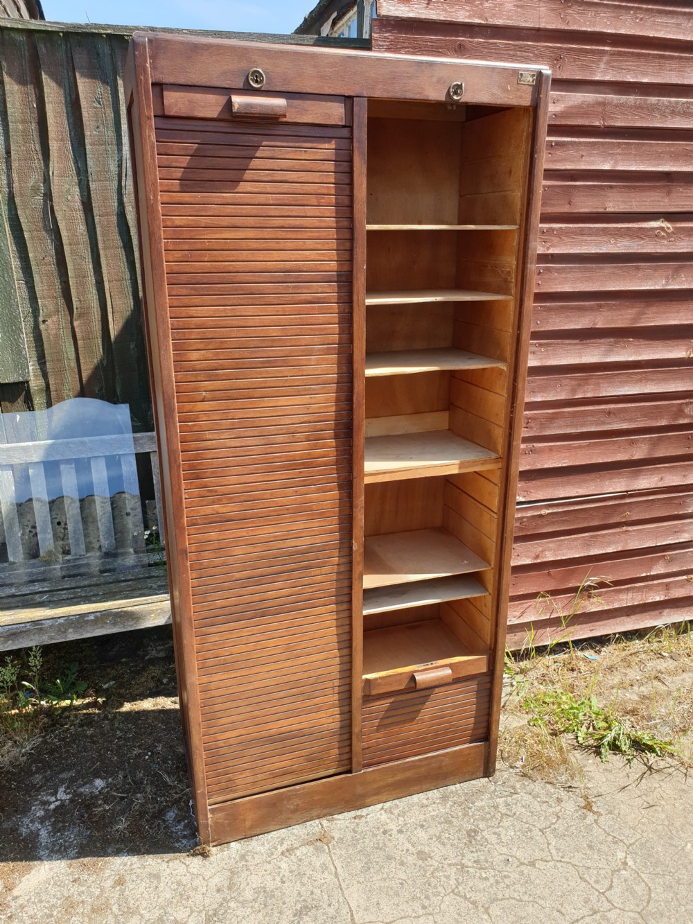 Early 20th century double tambour front cabinet.  View III