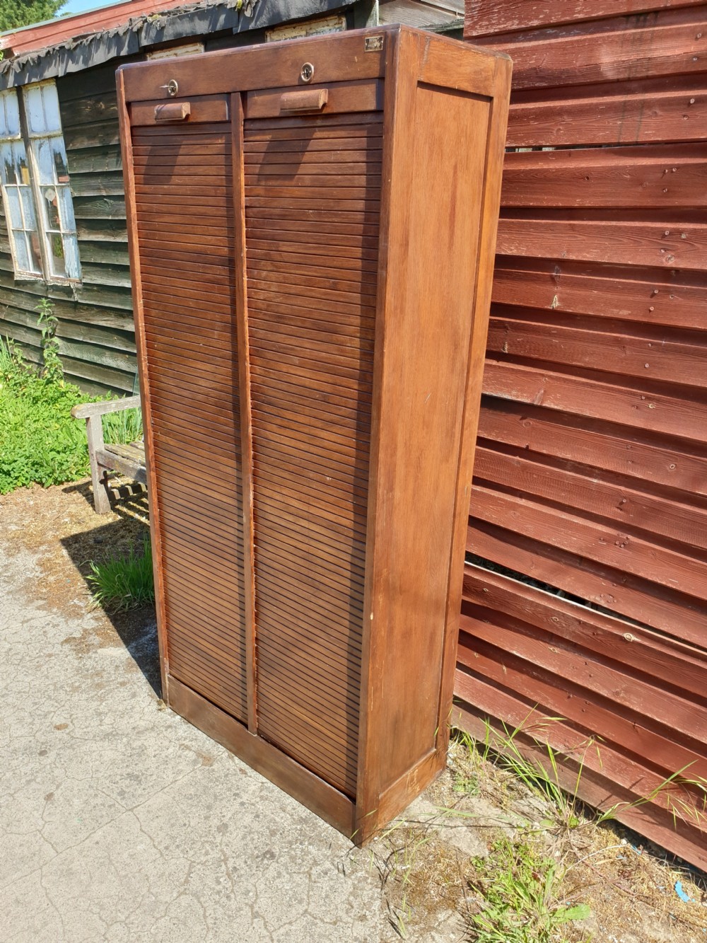 Early 20th century double tambour front cabinet.  View IV