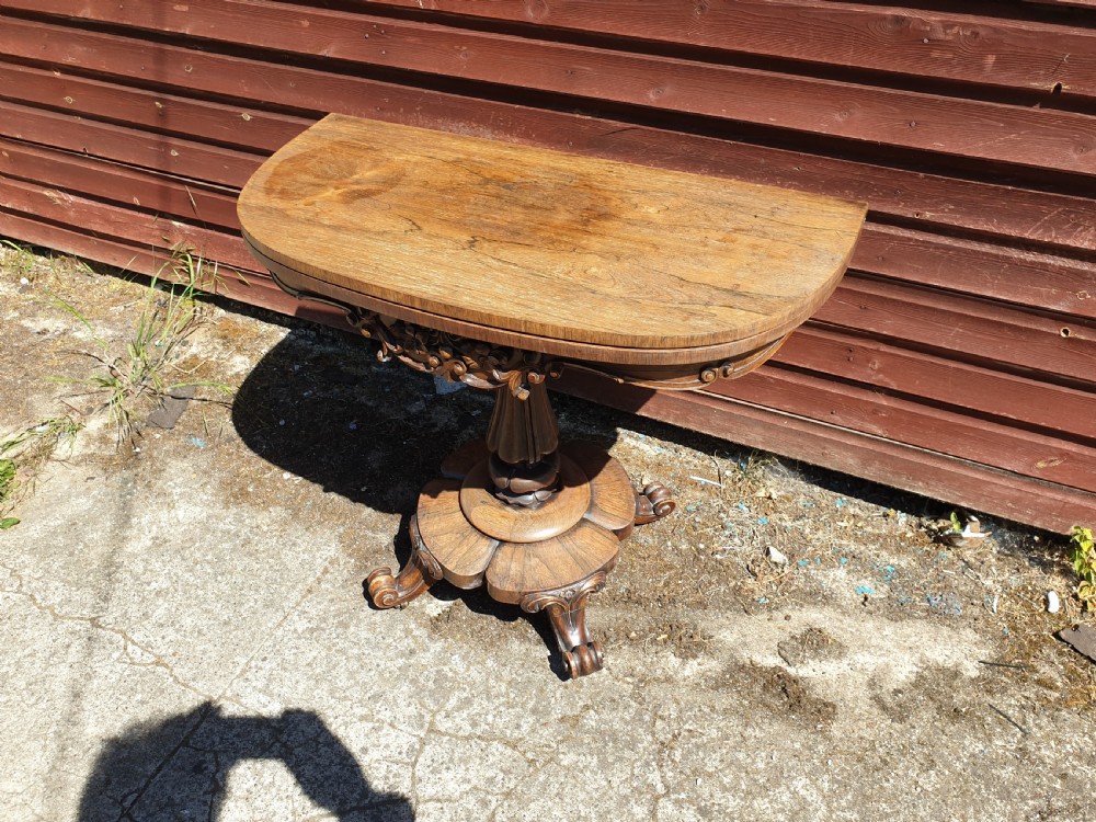 Early Victorian rosewood swivel top games table