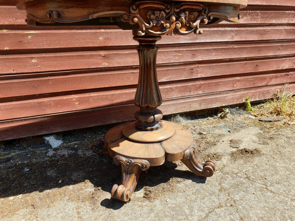 Early Victorian rosewood swivel top games table View II