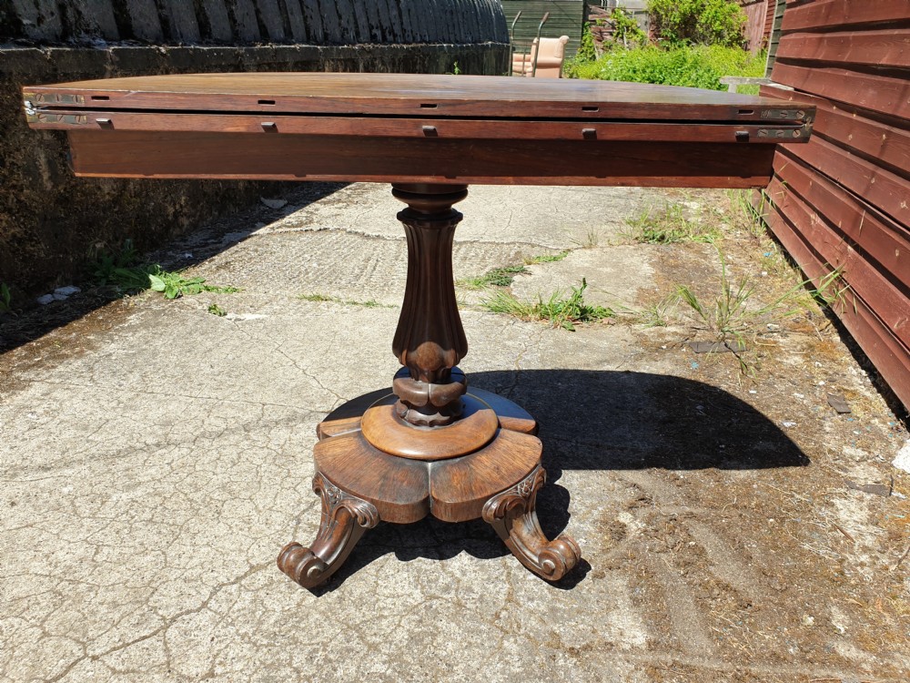Early Victorian rosewood swivel top games table View IV