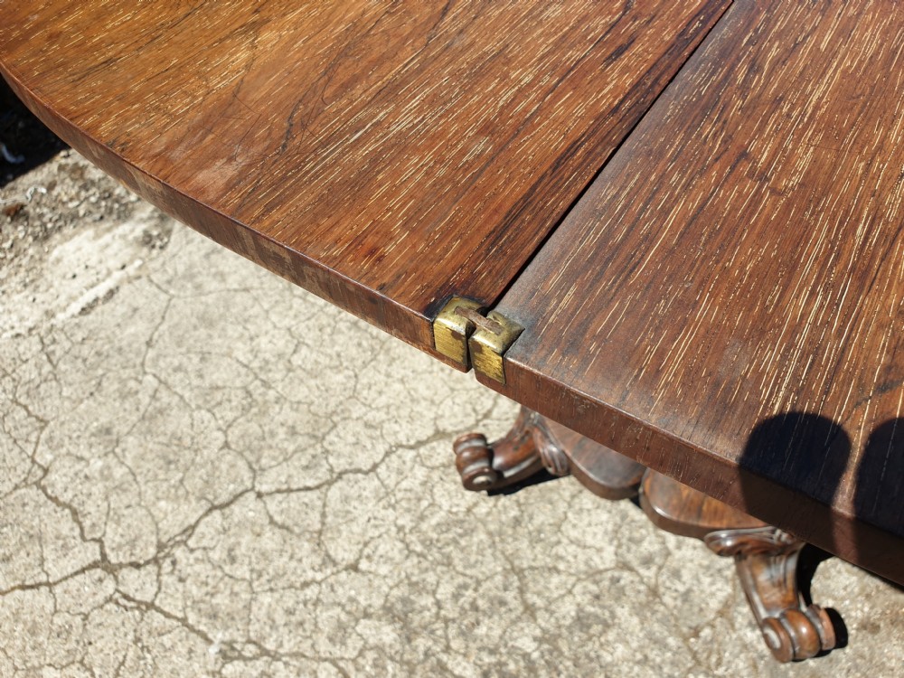 Early Victorian rosewood swivel top games table View VIII