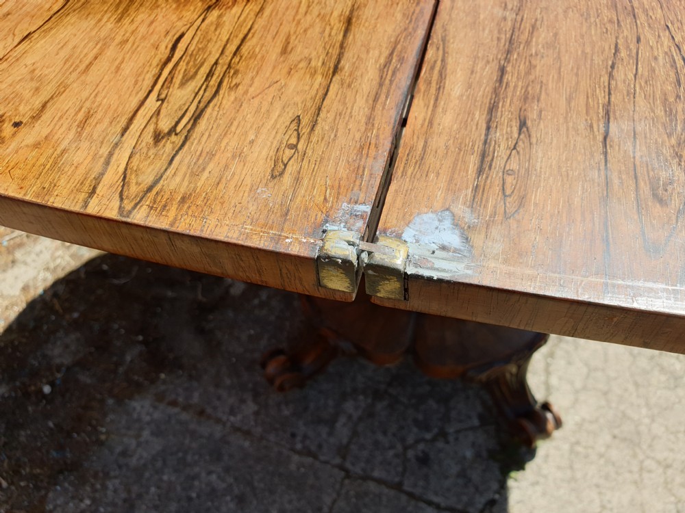 Early Victorian rosewood swivel top games table View IX