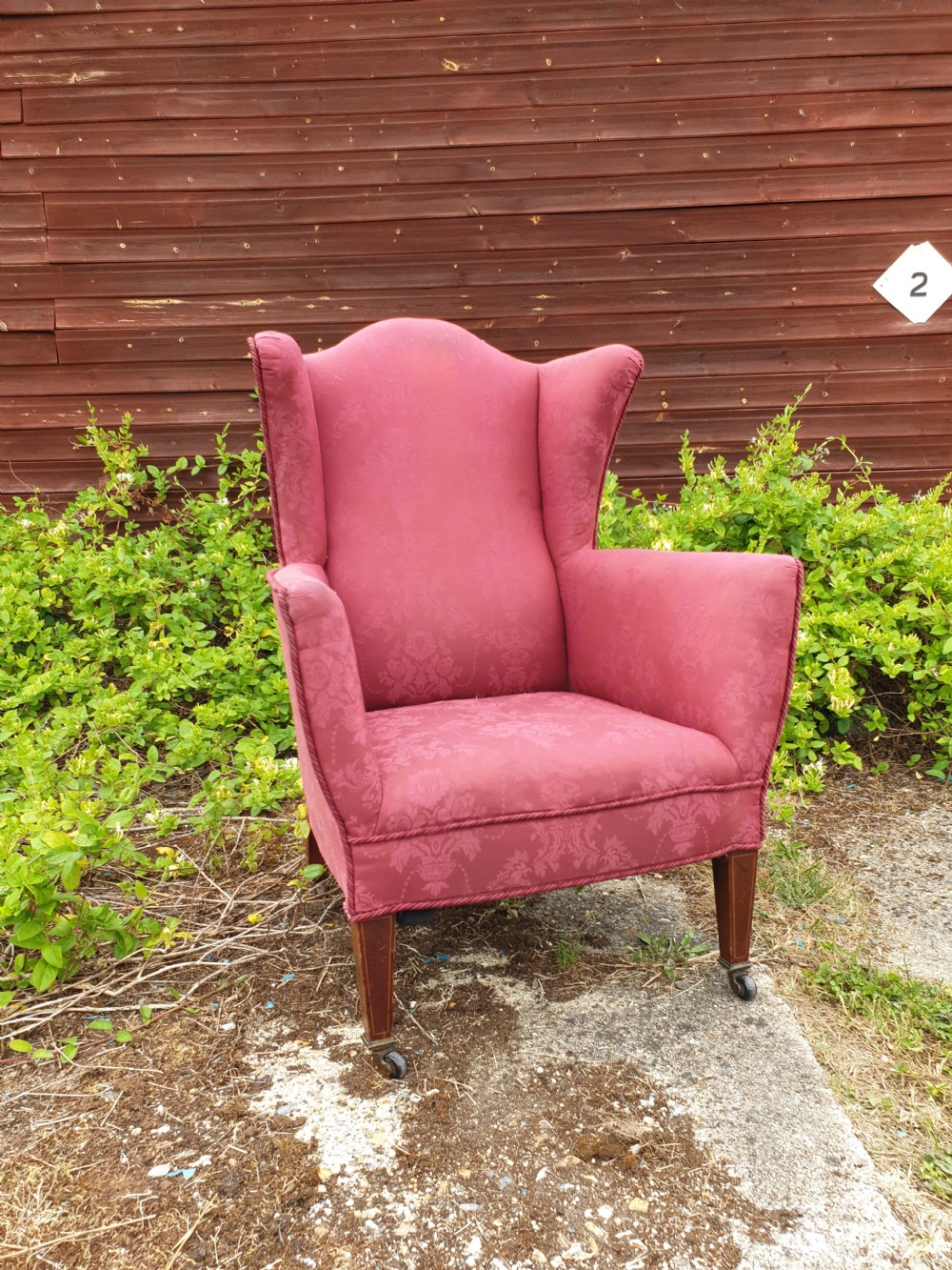 Edwardian inlaid mahogany wing back upholstered chair of good size. 