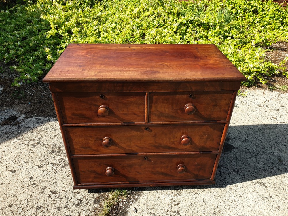Practical early Victorian mahogany chest of drawers.  View IV