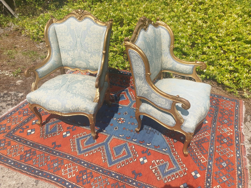 Pair of carved gilt frame armchairs 
