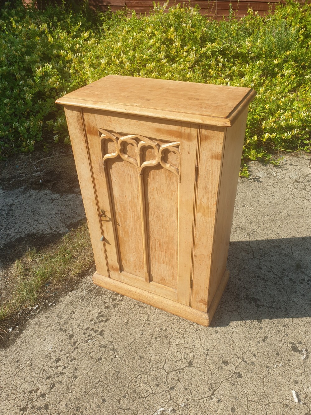 Useful 19th century Gothic pine cupboard. 