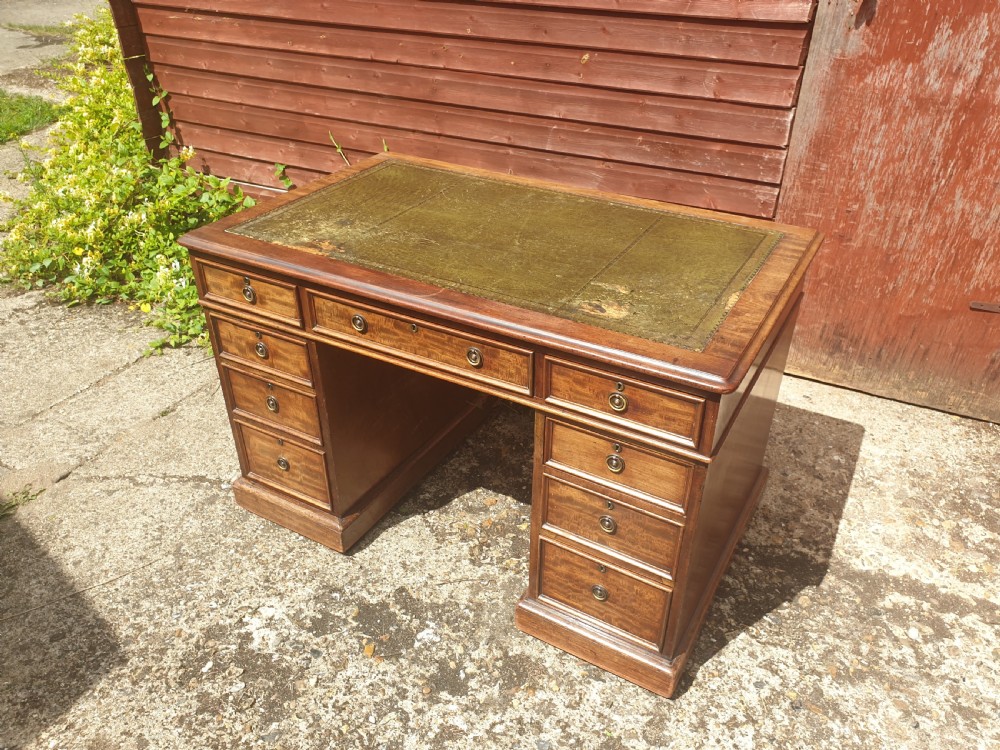 Mid 19th century mahogany kneehole pedestal desk.  View V