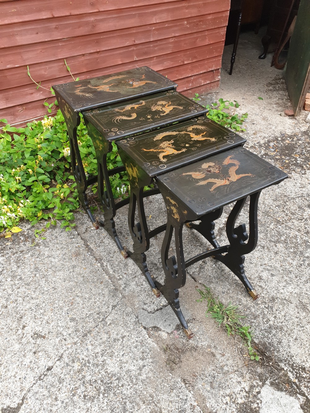 Nest 4 early 20th century lacquered occasional tables 