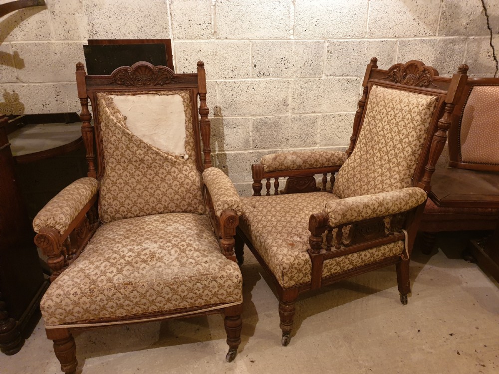 Large pair of oak frame Library armchairs 