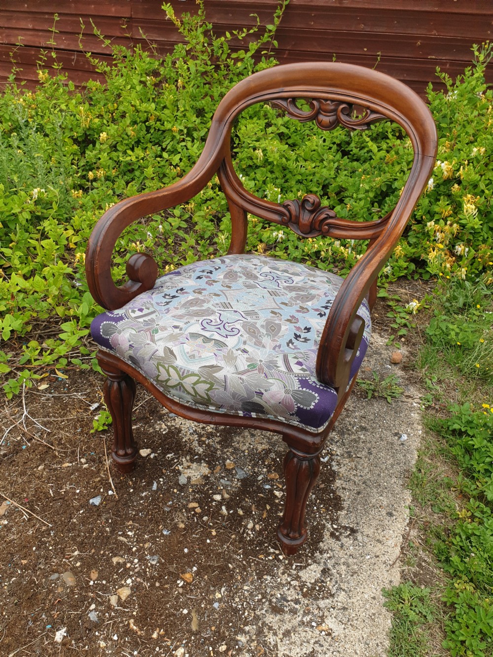Mid 19th century scroll arm mahogany desk armchair.  View II