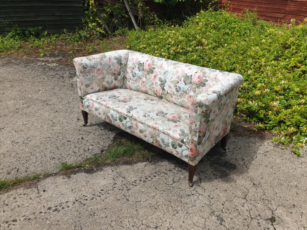Upholstered 2 seater Edwardian sofa.