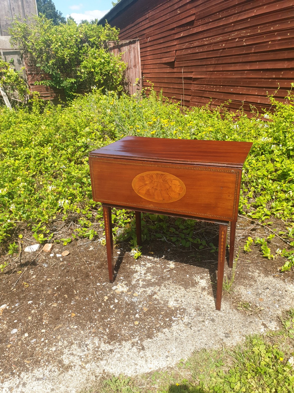 Early 19th century inlaid drop flap night table. View II
