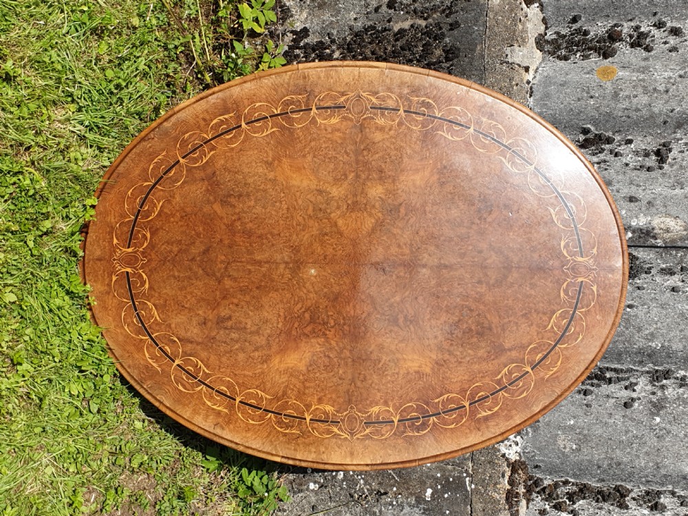 Victorian inlaid walnut pedestal tip top table. View II