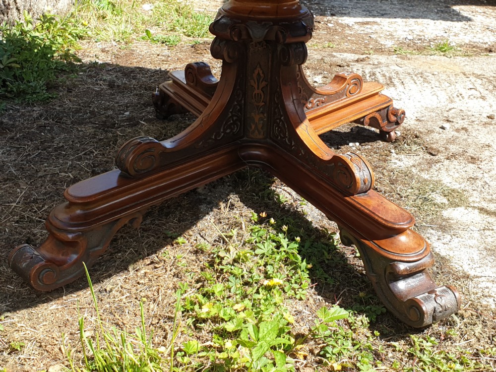 Victorian inlaid walnut pedestal tip top table. View VI
