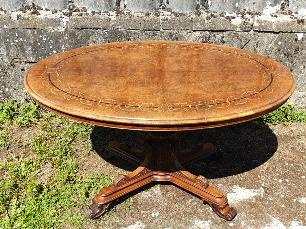 Victorian inlaid walnut pedestal tip top table. View VII