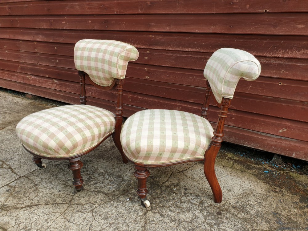 Pair of late Victorian walnut frame nursing chairs. 