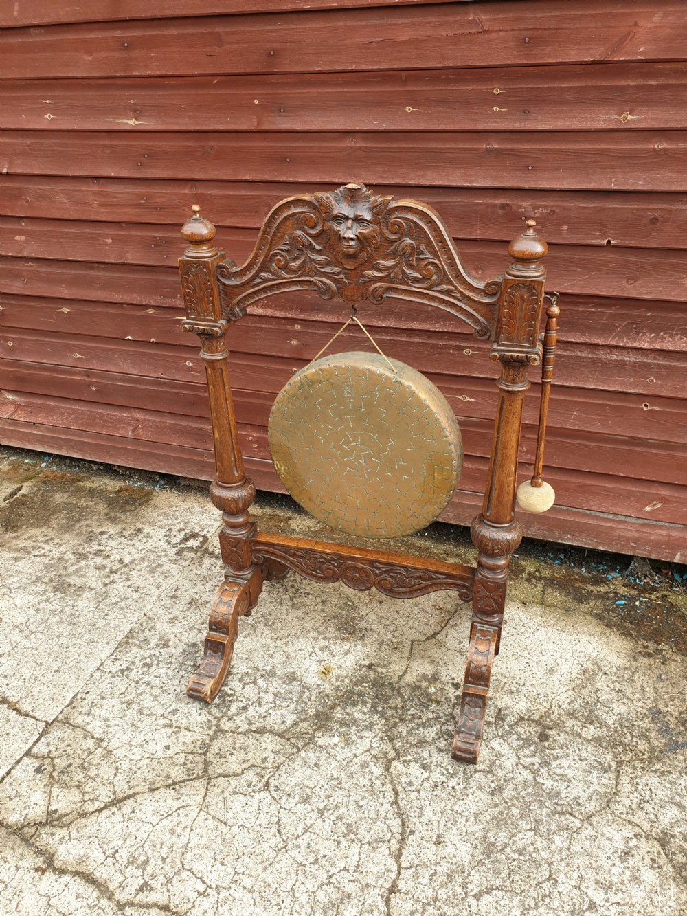 Late Victorian carved oak dinner gong. 