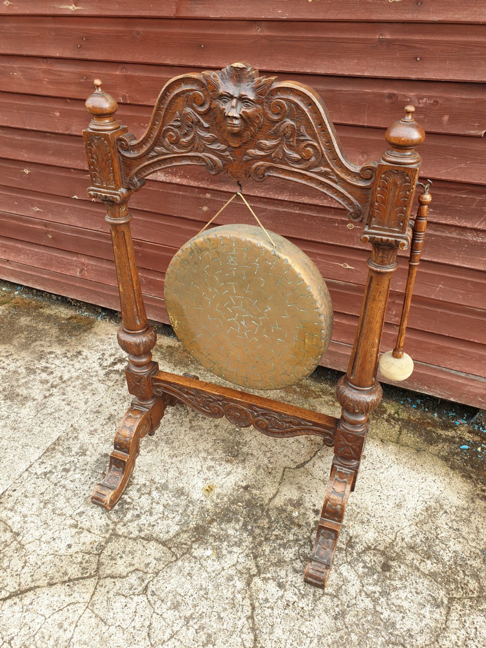 Late Victorian carved oak dinner gong.  View II
