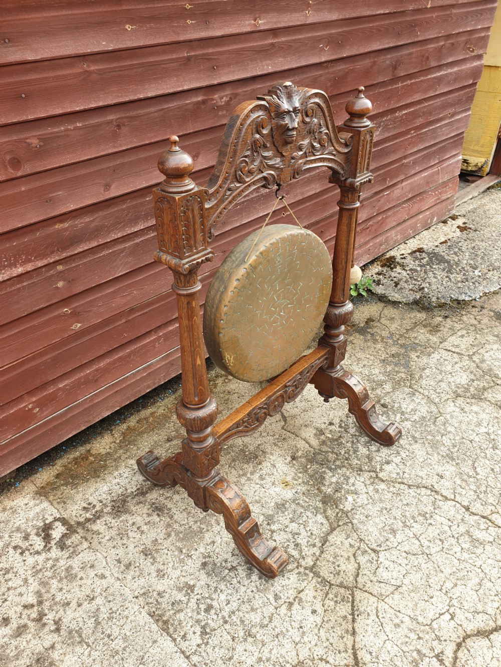 Late Victorian carved oak dinner gong.  View III