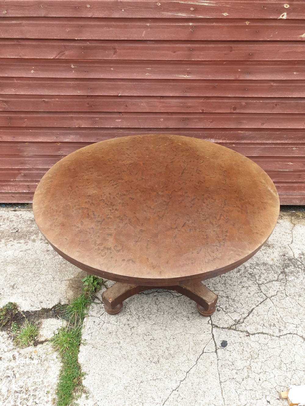 Early Victorian plum mahogany tip top centre table. 