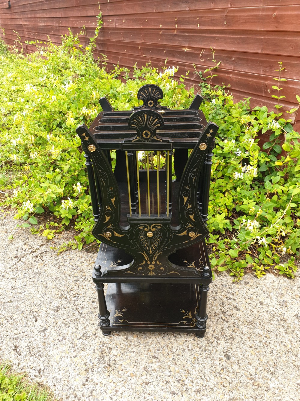 Victorian ebonised and gilt Canterbury table.  View VI