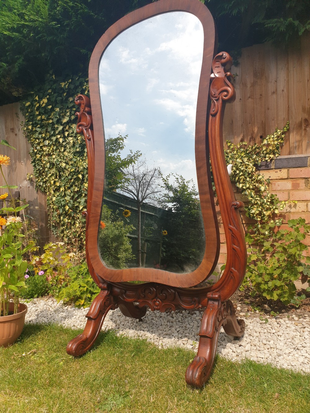 Mid Victorian mahogany cheval dressing mirror.  View II