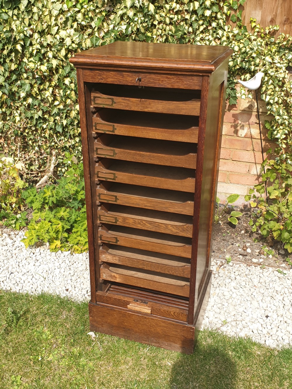 Early 20th century oak tambour front office cabinet.  View II