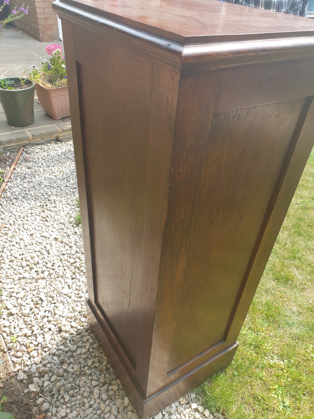 Early 20th century oak tambour front office cabinet.  View IV