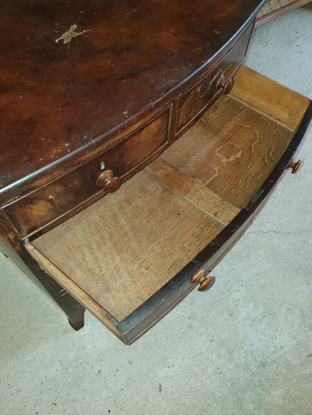 Diminutive mahogany bow front chest. View II