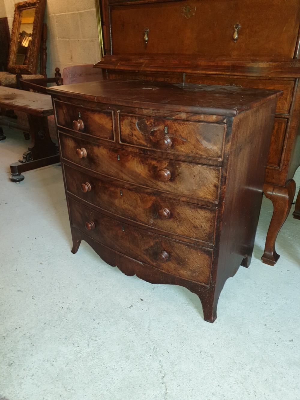 Diminutive mahogany bow front chest. View V