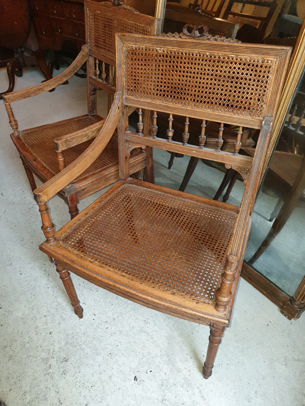 Pair of caned bergere armchairs  View IV